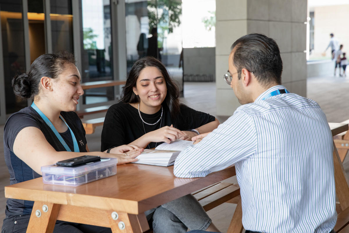 professor talking to students