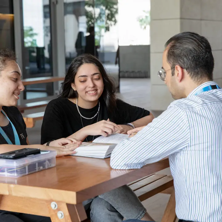 professor talking to students