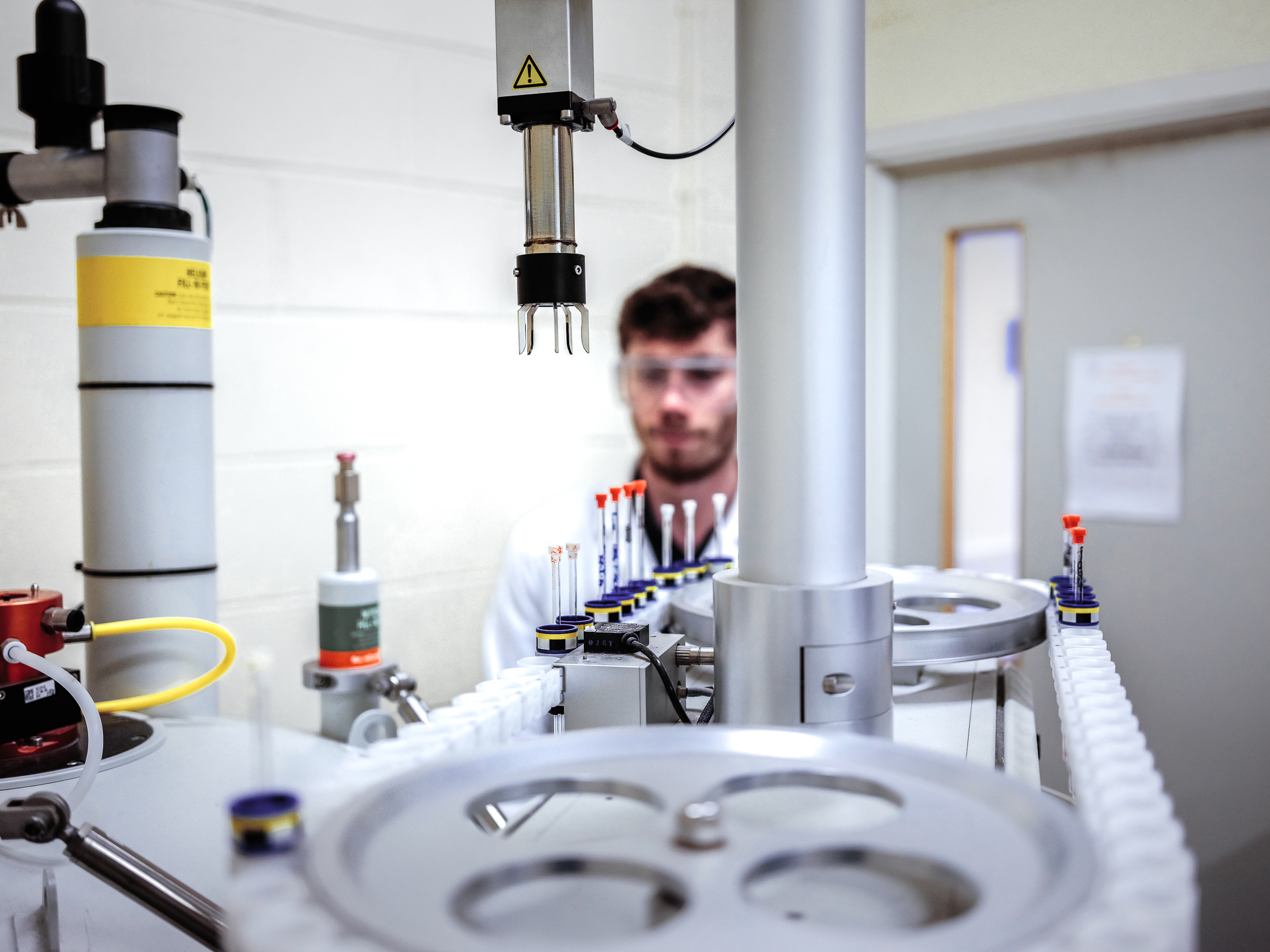 Chemistry student testing chemical samples