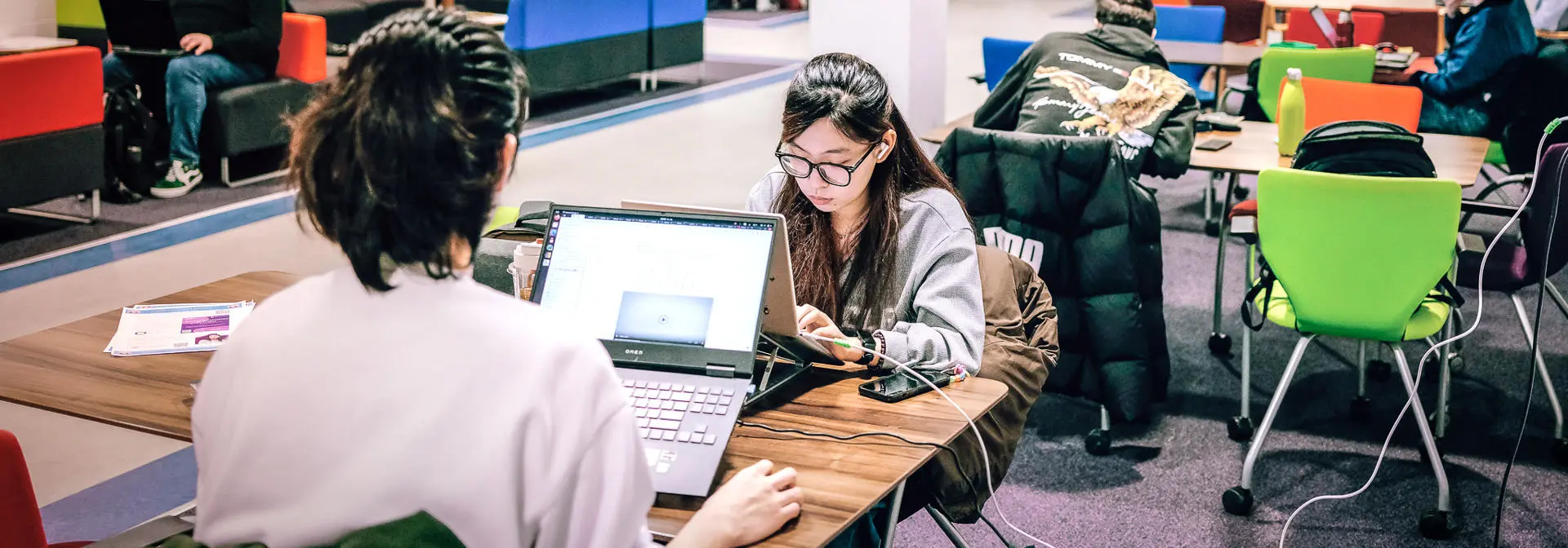 Students working in a common area