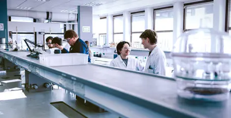Students chatting in Chemistry lab