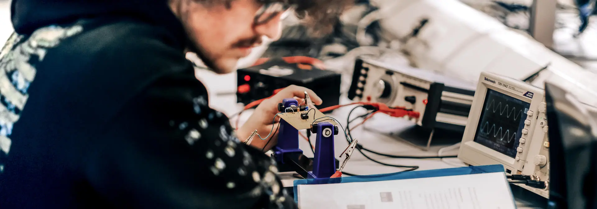 Physics student testing electrical current