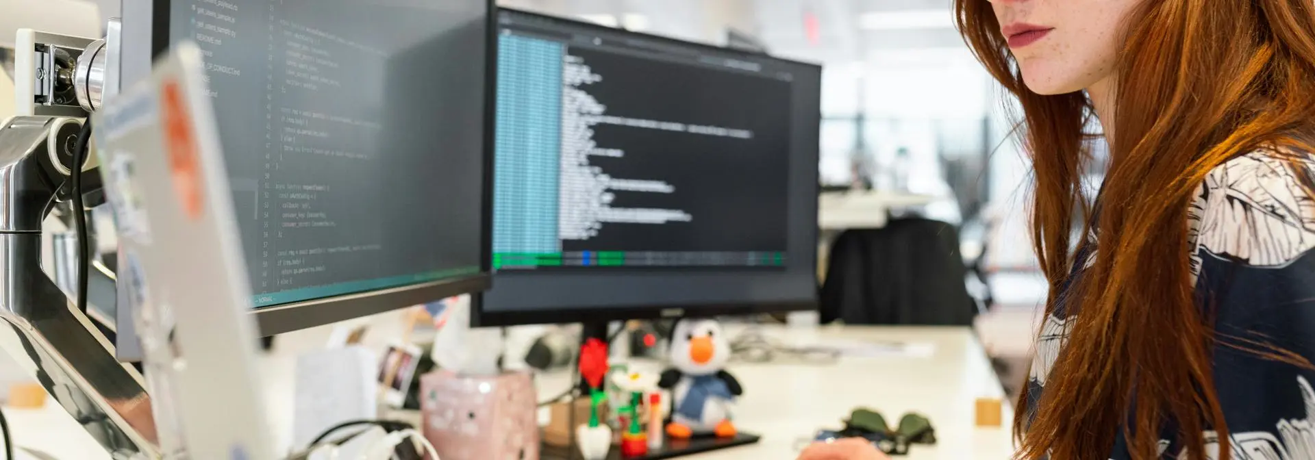 female programmer working on code