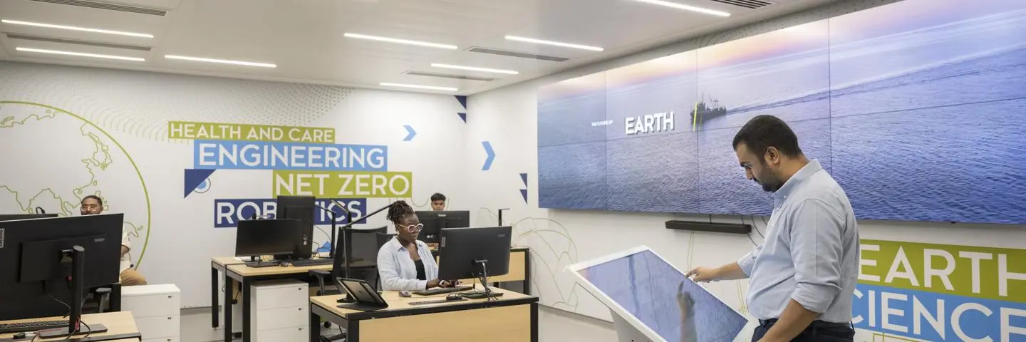 Dubai energy and renewables study room with students on computers