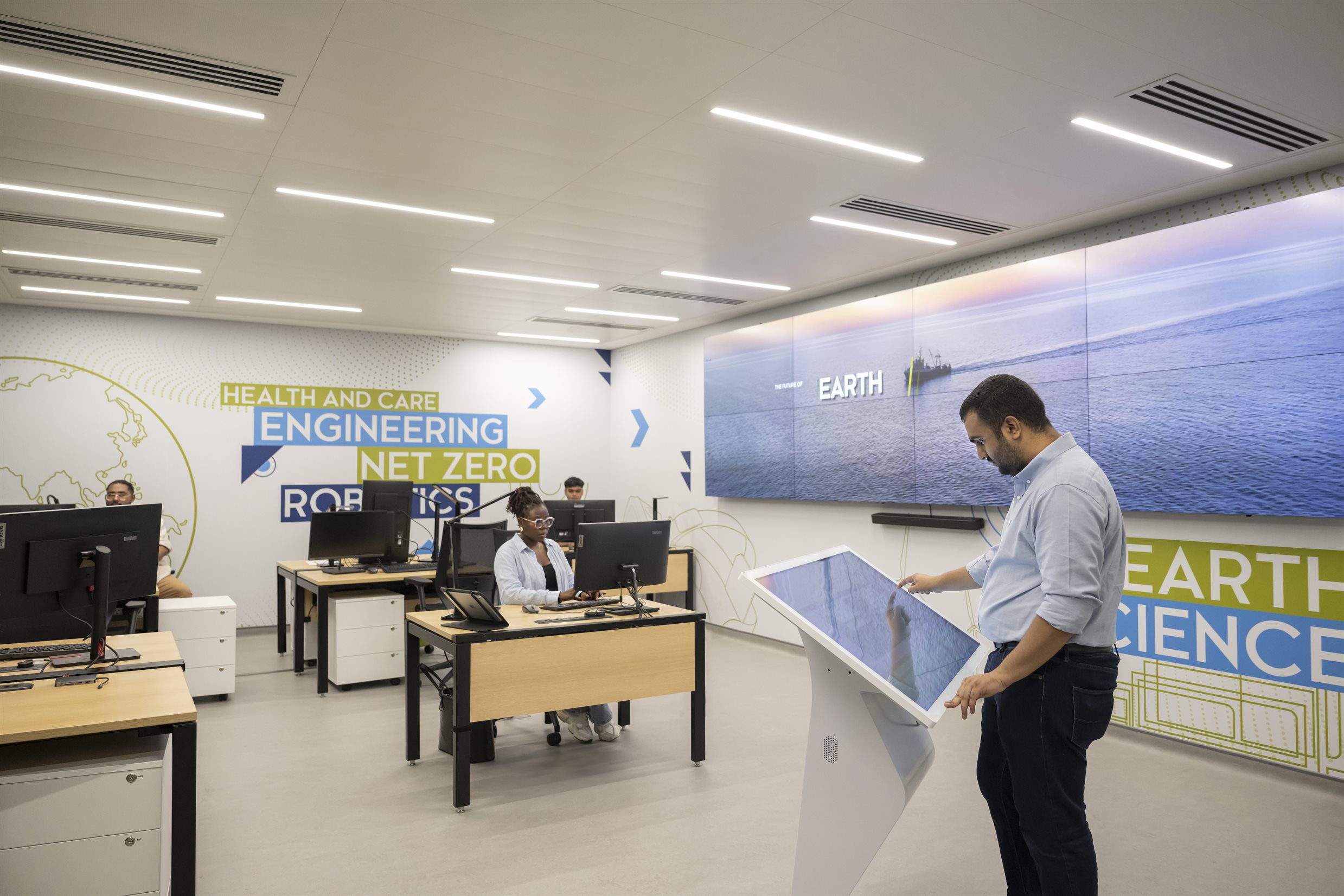 Dubai energy and renewables study room with students on computers