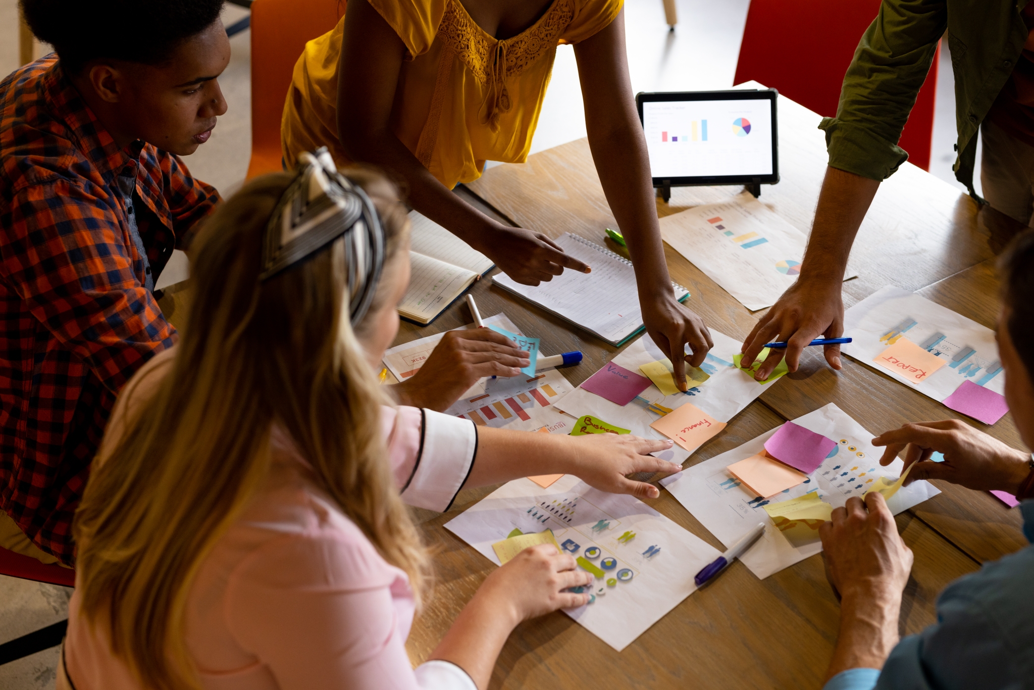 High angle view of students working on design project on a table