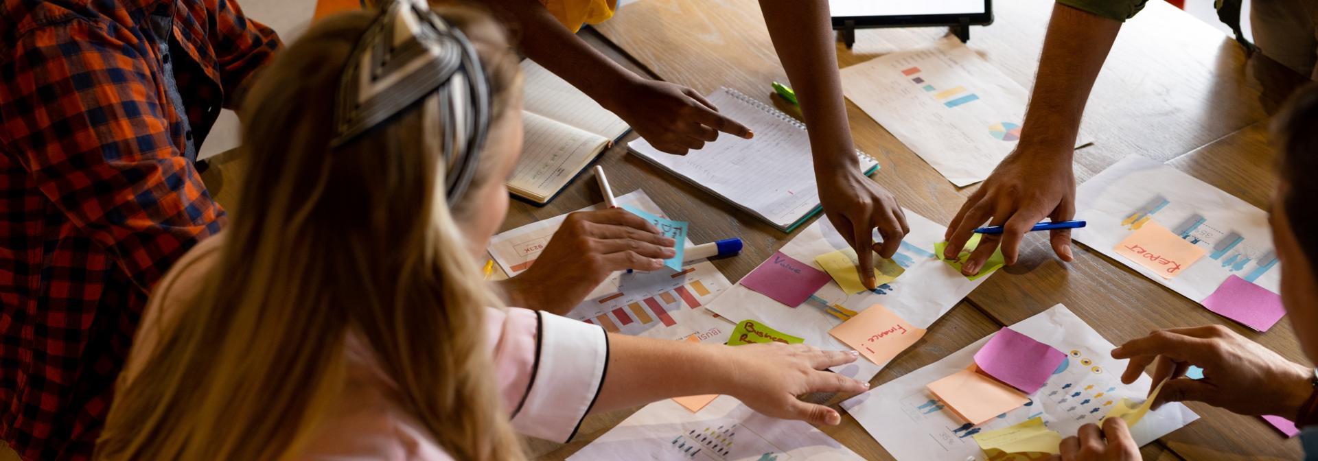High angle view of students working on design project on a table