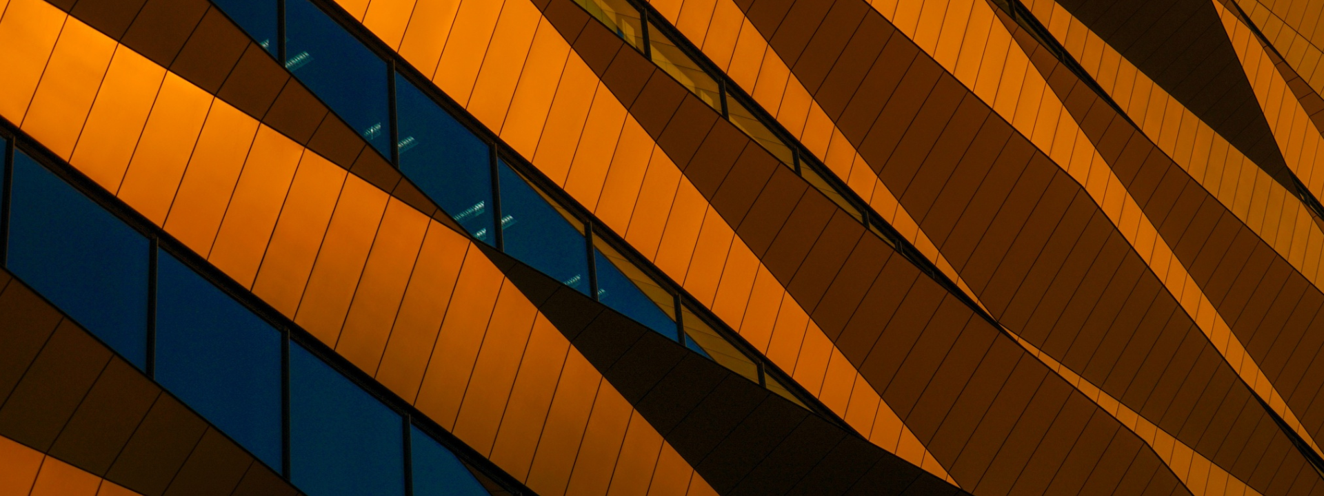 Orange modern glass building.