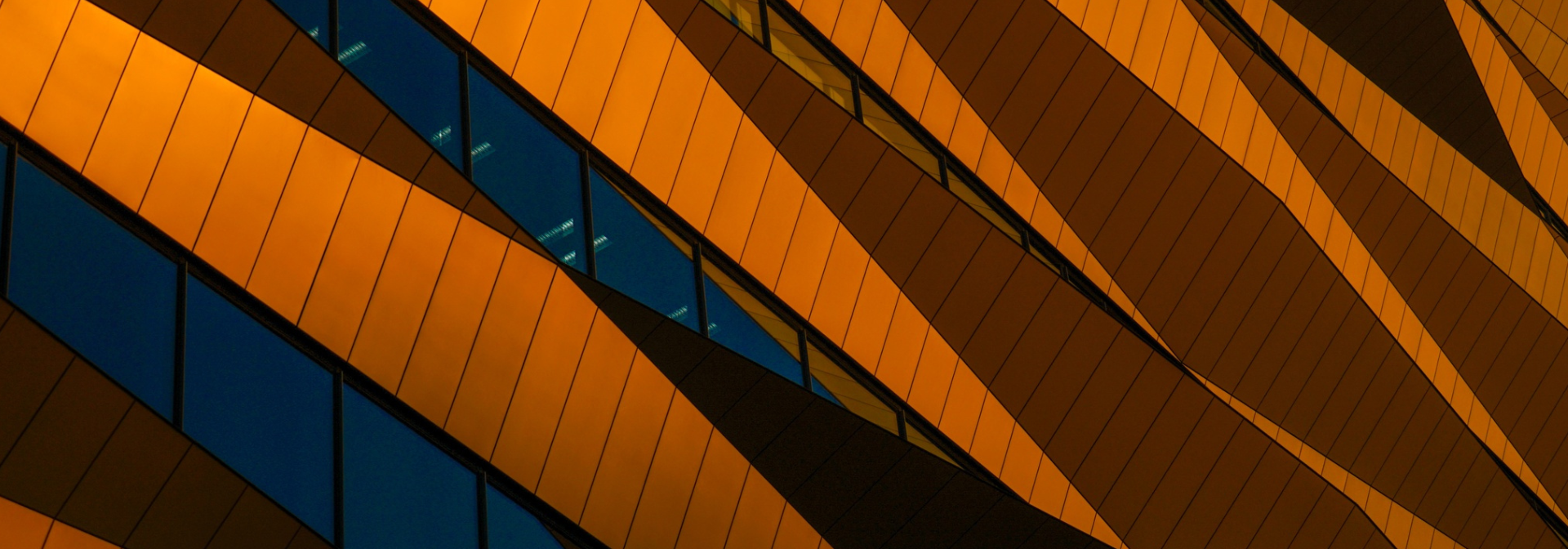 Orange modern glass building.