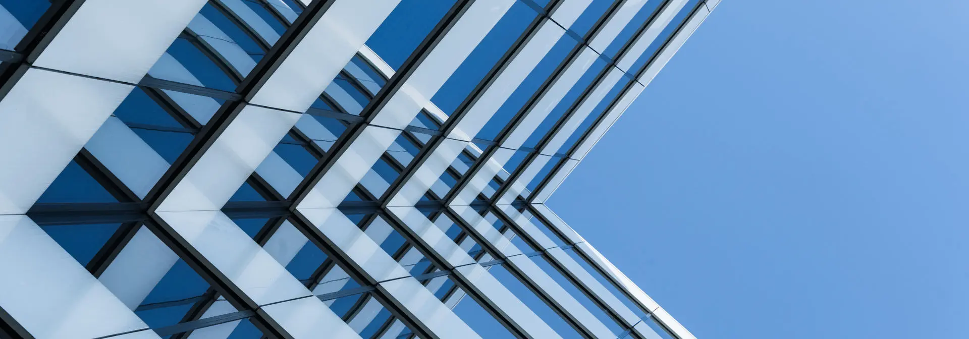 Glass modern building with metal panels