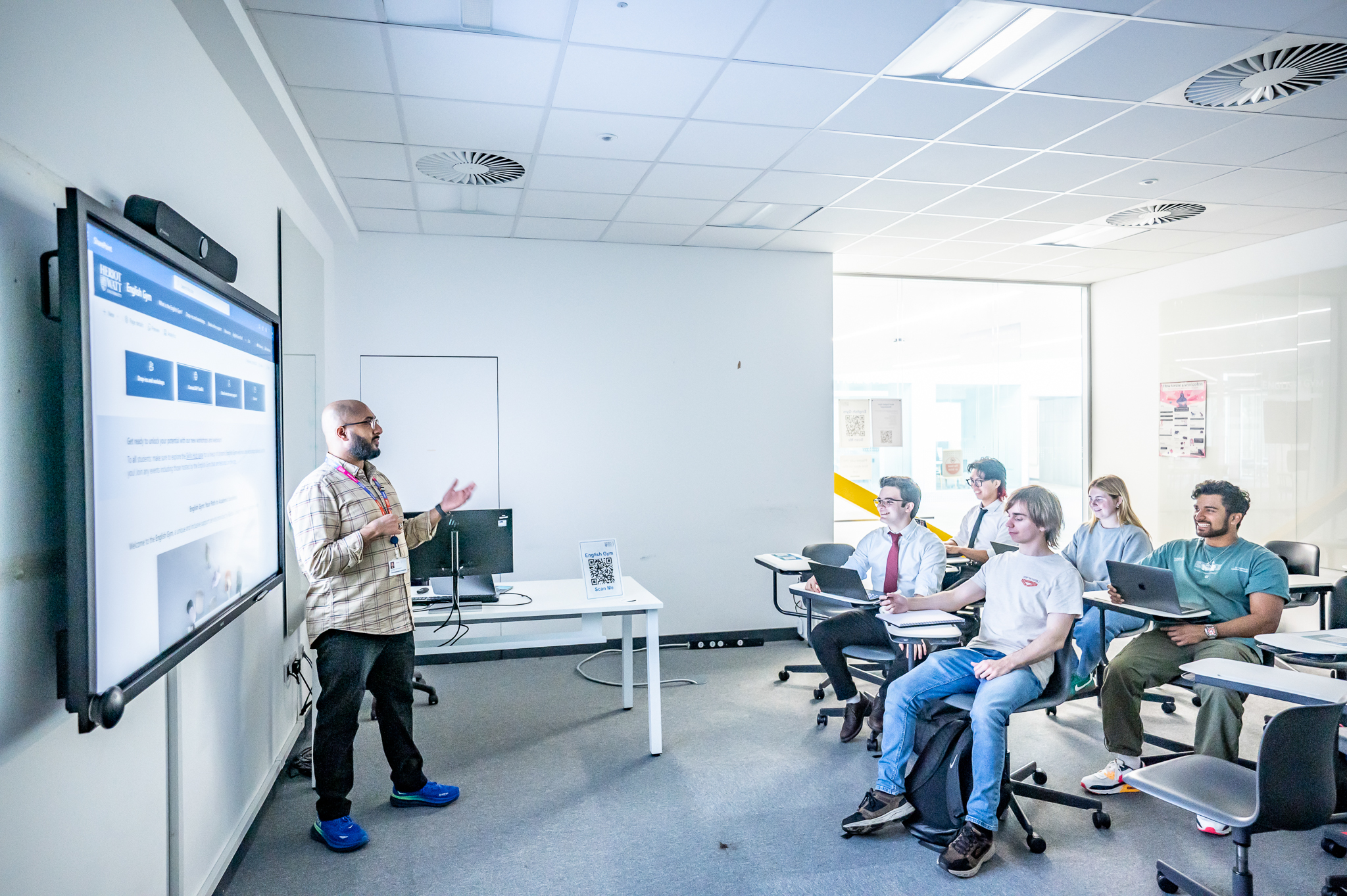 Professor giving a lecture in a classroom
