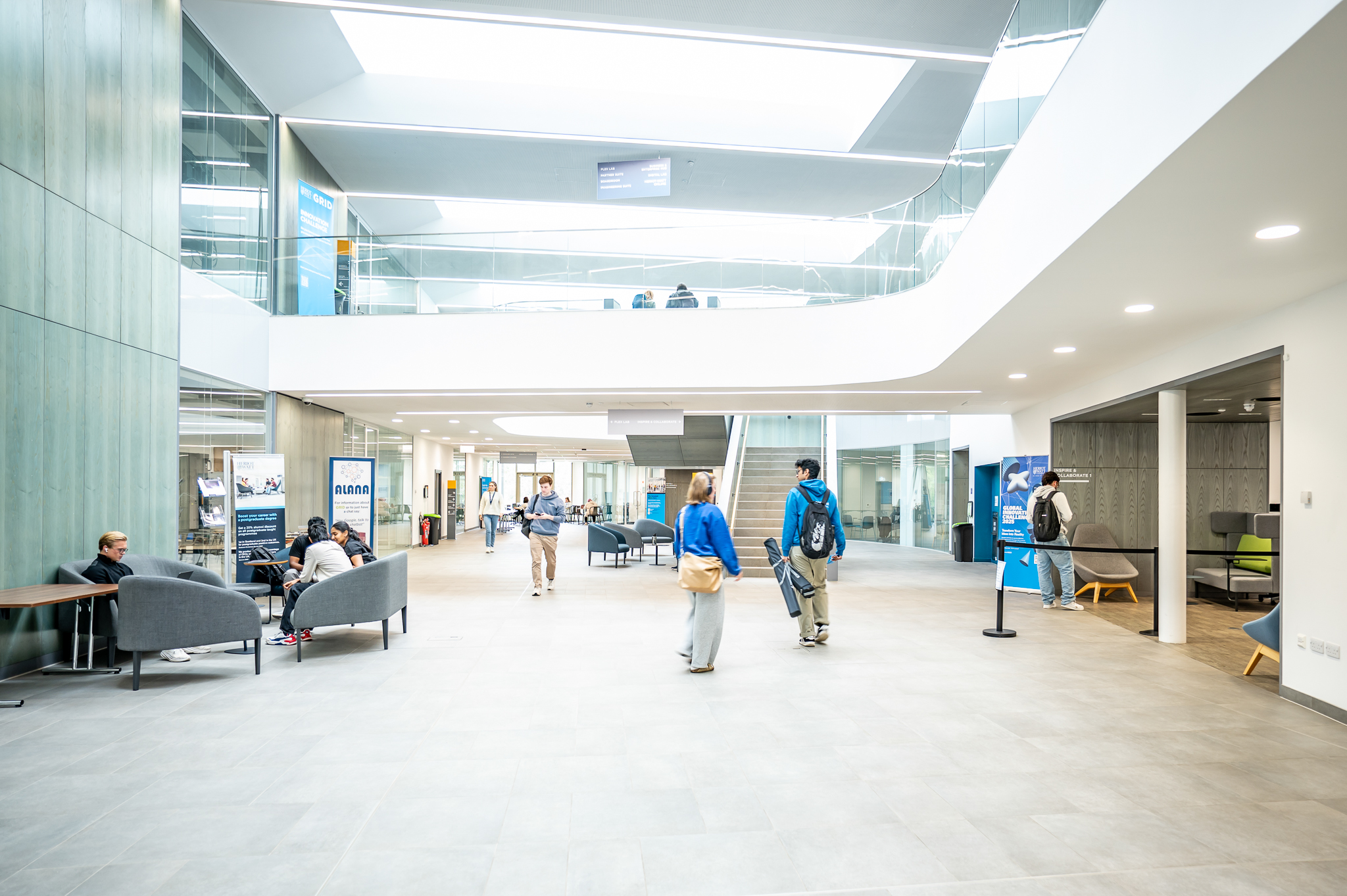 Students walking around in the Heriot-Watt GRID building