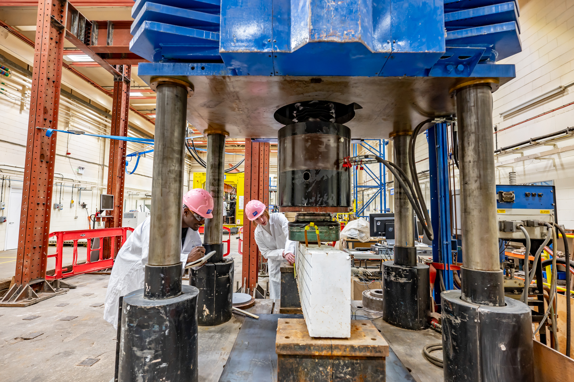 Students performing a pressure test in a lab