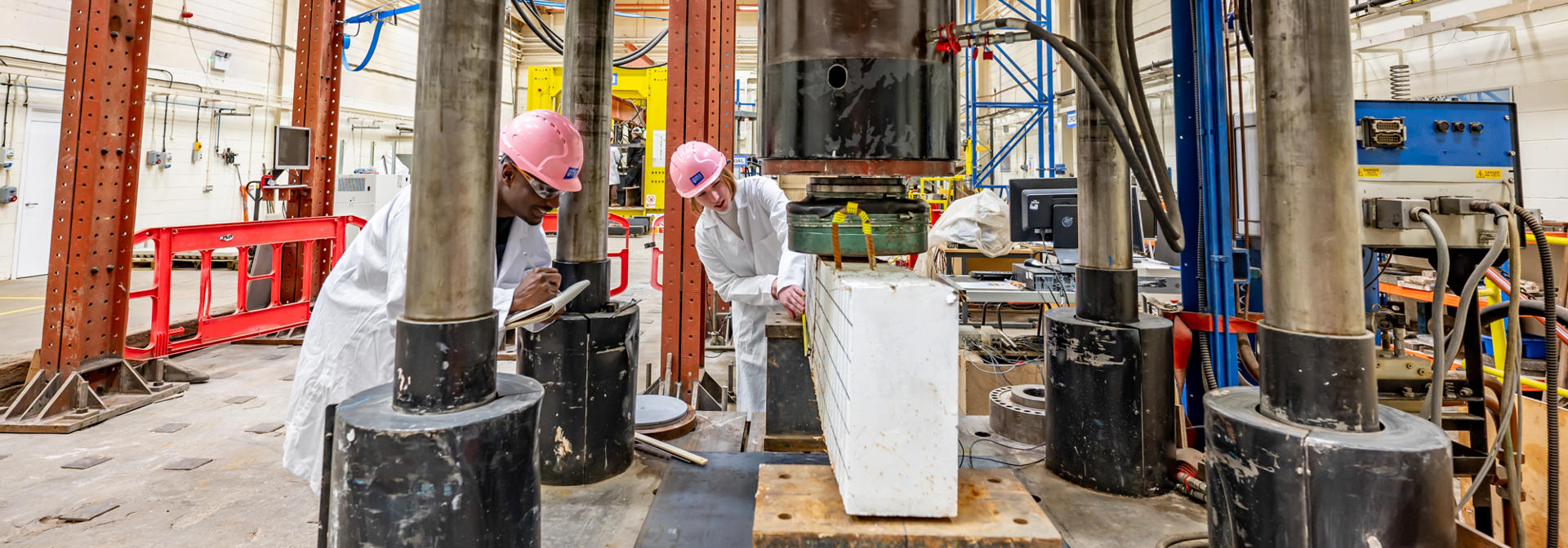 Students performing a pressure test in a lab