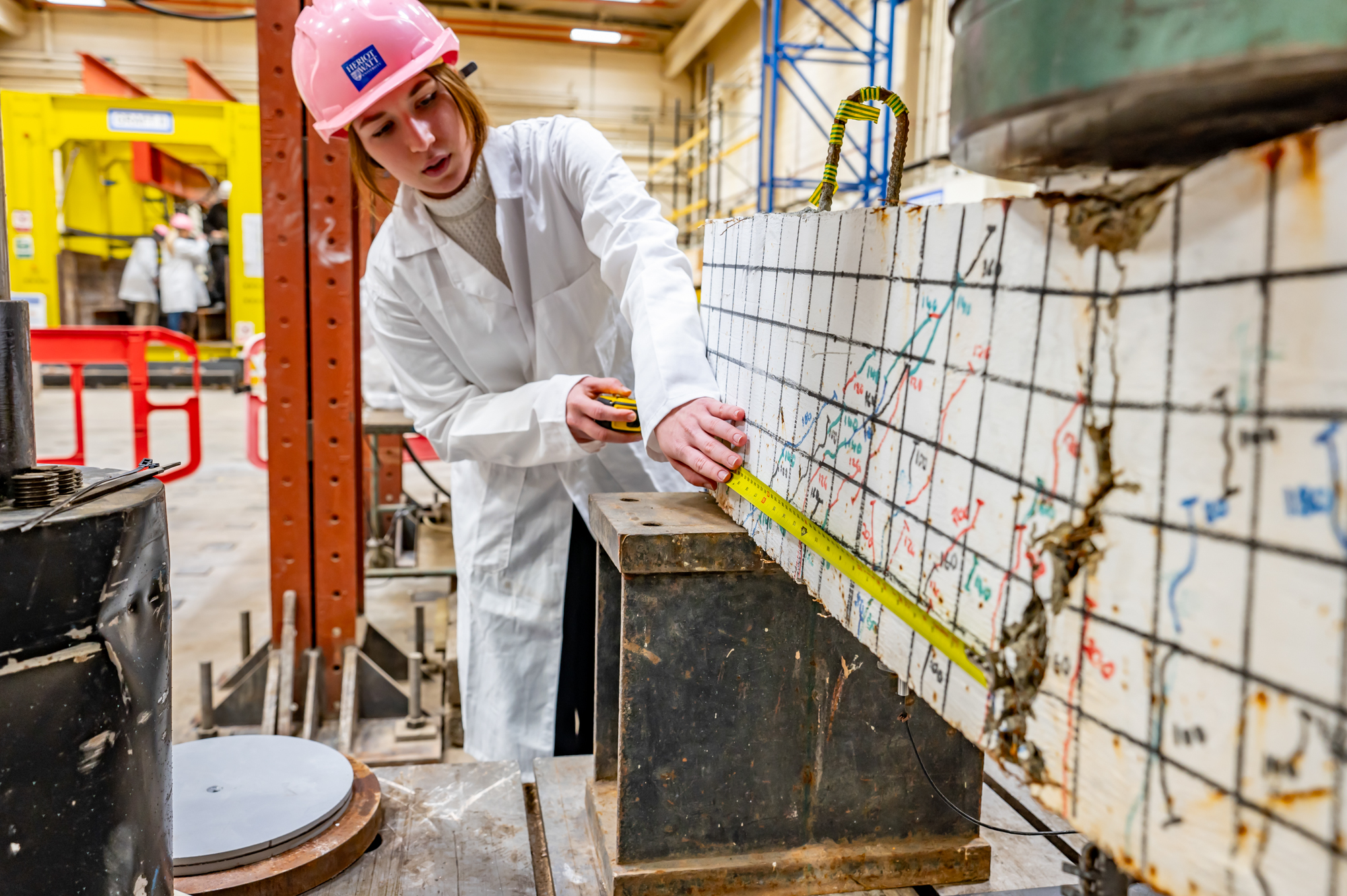 Student performing a pressure test in a lab