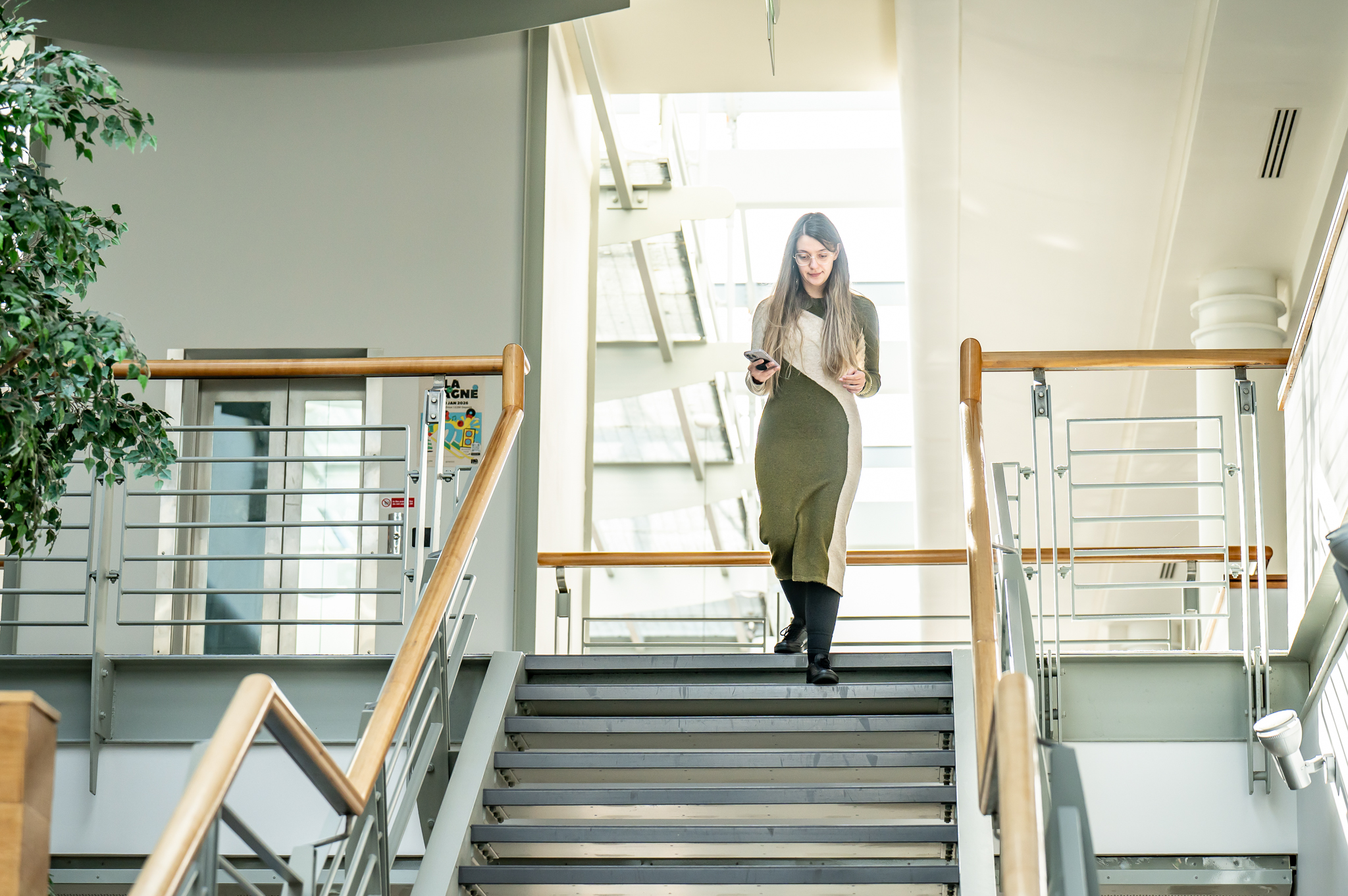 Student walking down the stairs