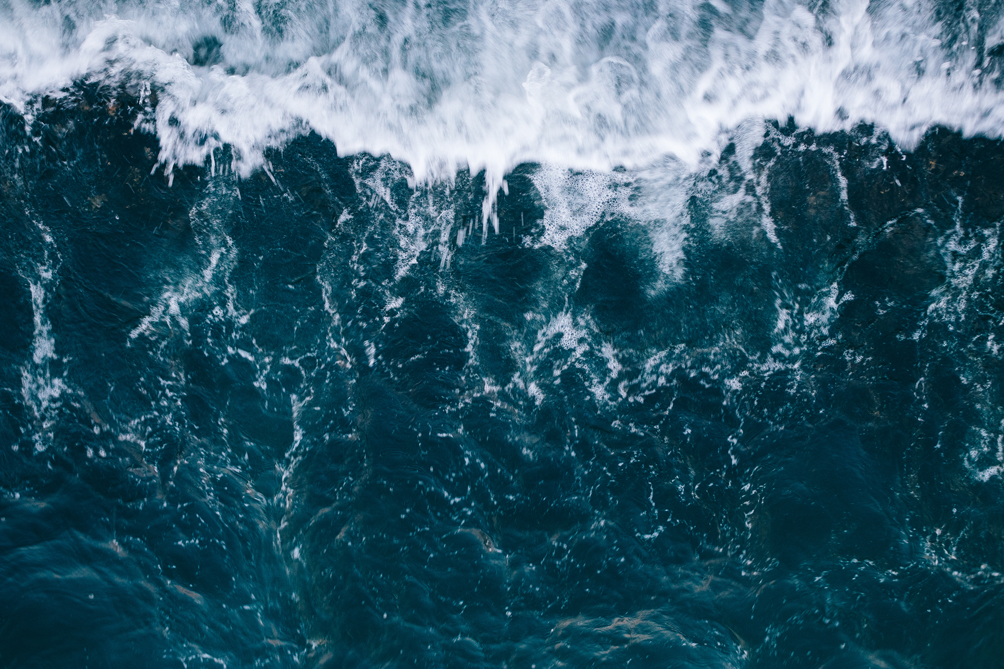 Crashing ocean waves from a bird's eye view