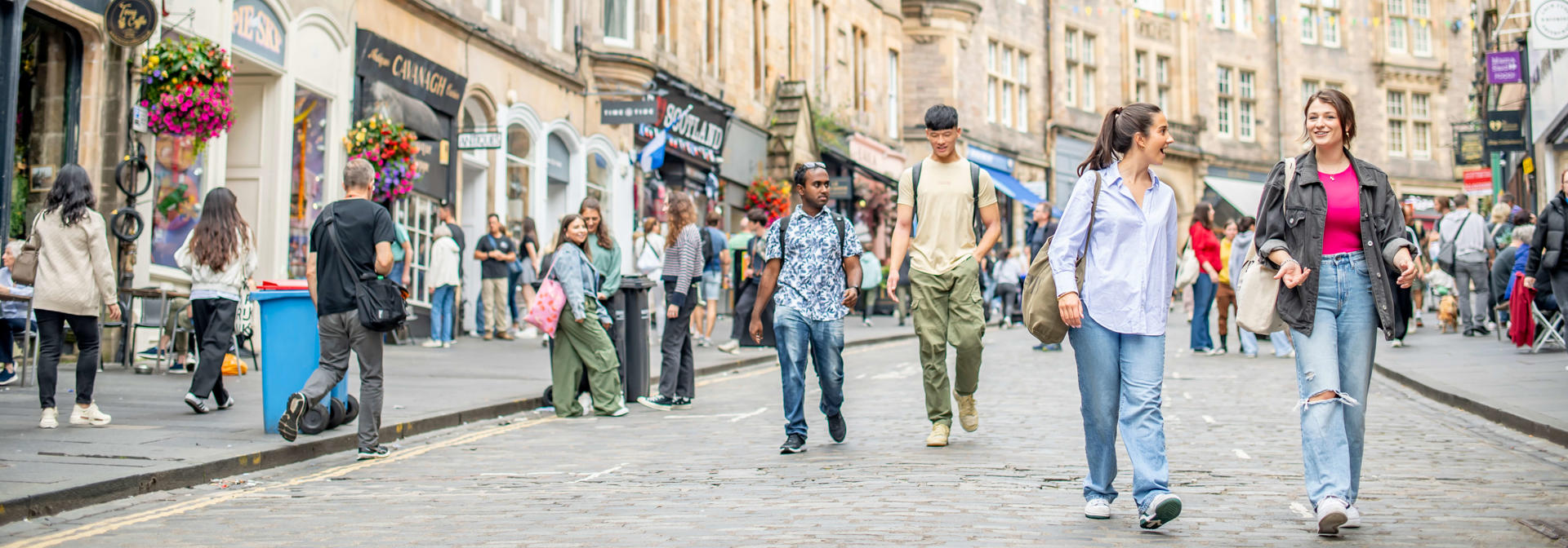 Students walking down Cockburn Street chatting