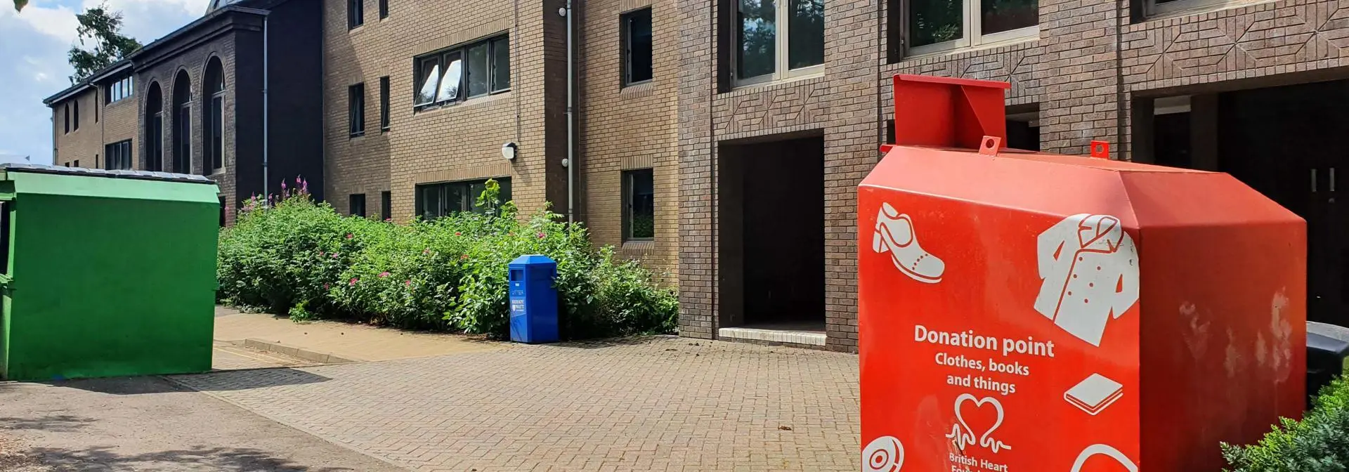 Recycling containers outside the Leonard Horner Hall building at the Edinburgh Campus