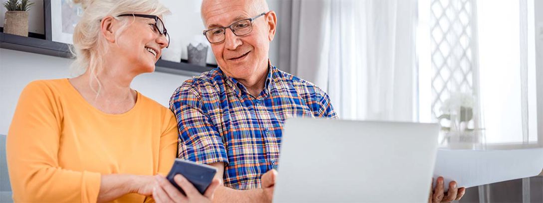 In-home health monitoring systems can be transformative for supporting healthy ageing but they also present ethical dilemmas around privacy. Two people looking at laptop