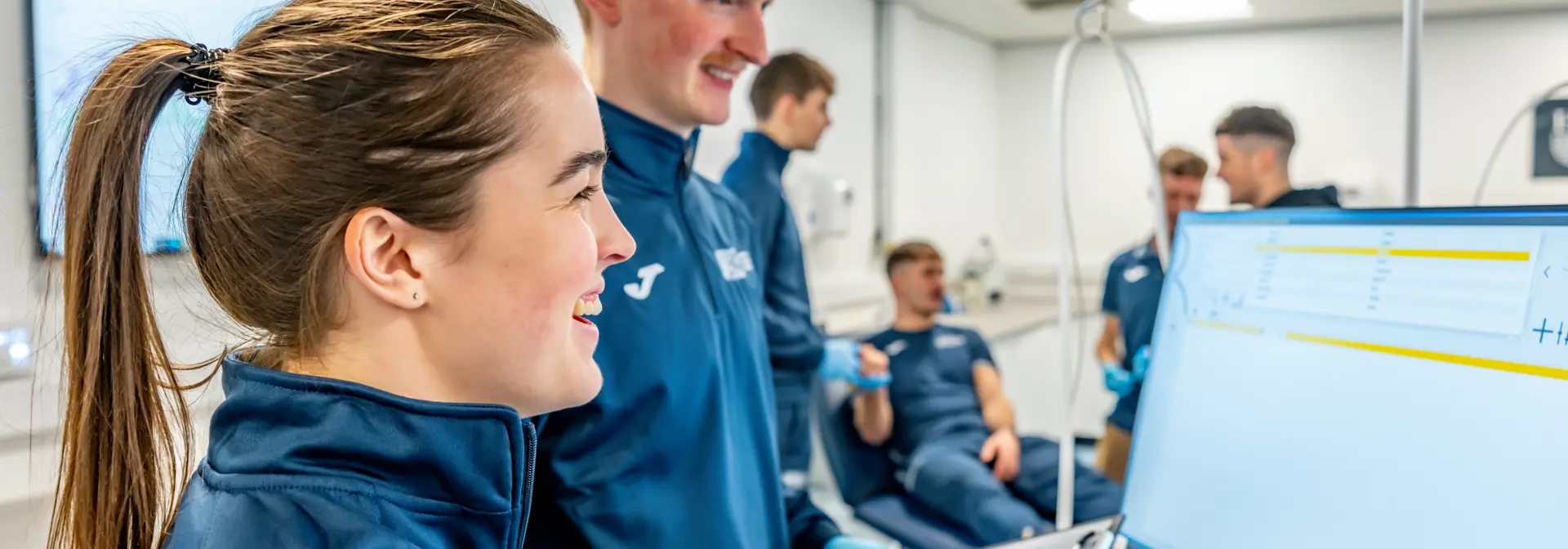 Students using computer equipment