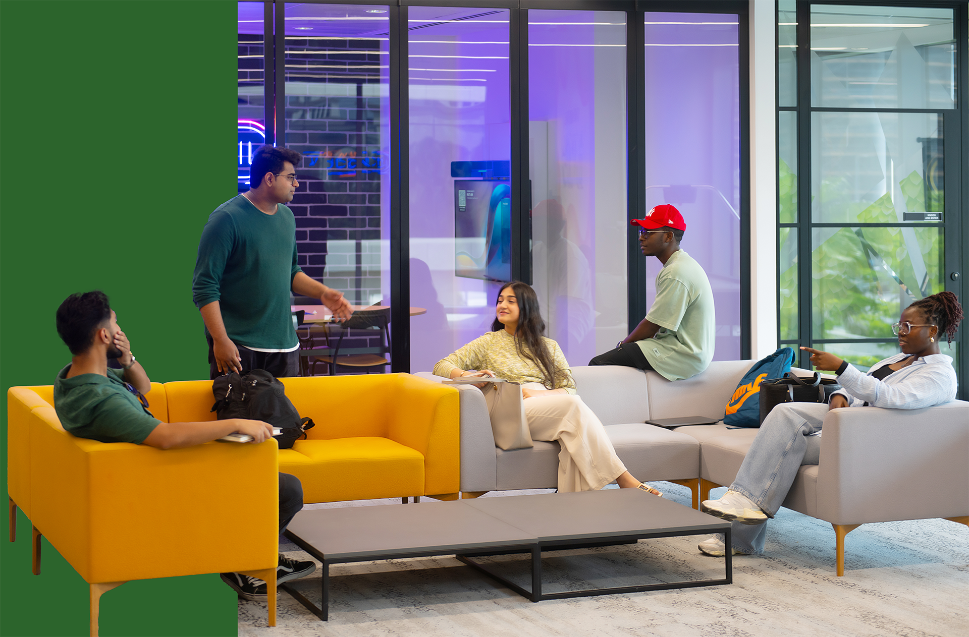 students sitting on sofa and socialising 