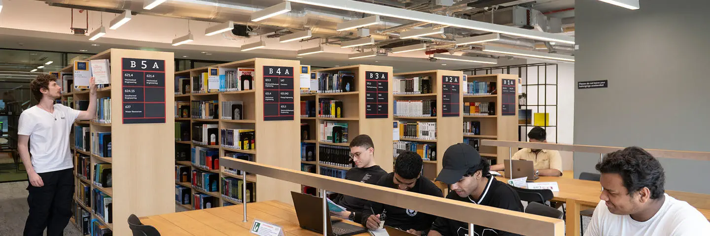 Students working in the Dubai campus library.