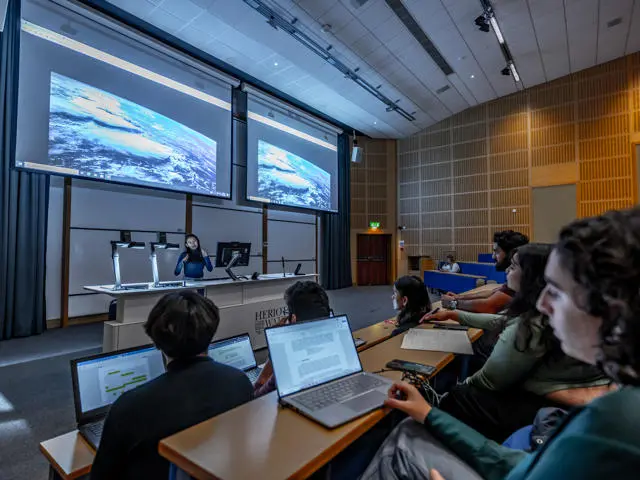 inside of a busy lecture theatre