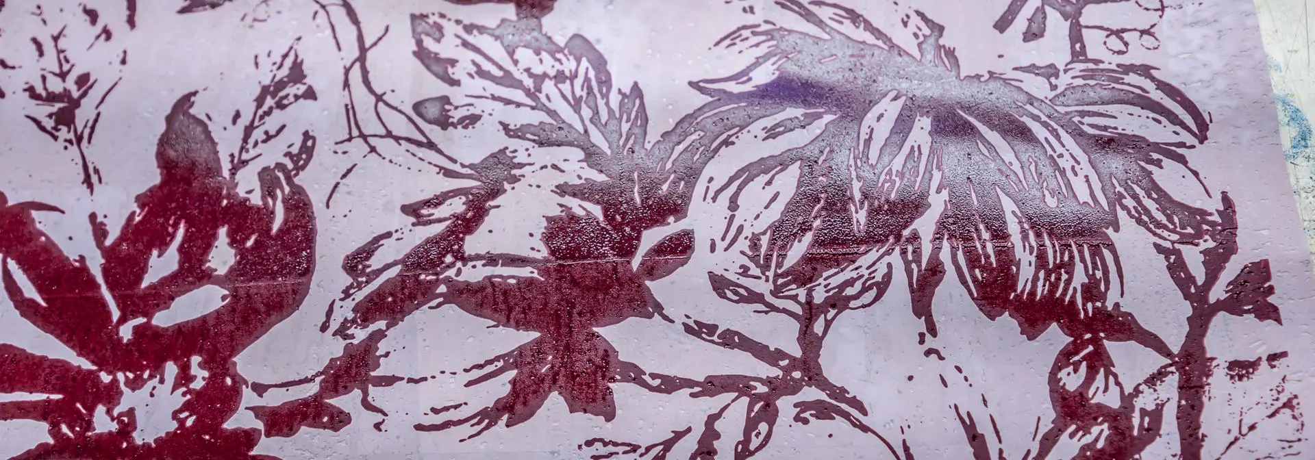 A red floral pattern on material.