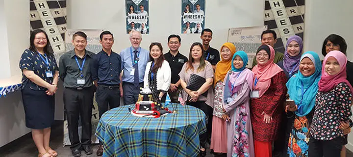 staff at the opening the 'Wheest' room at Heriot-Watt Malaysia campus