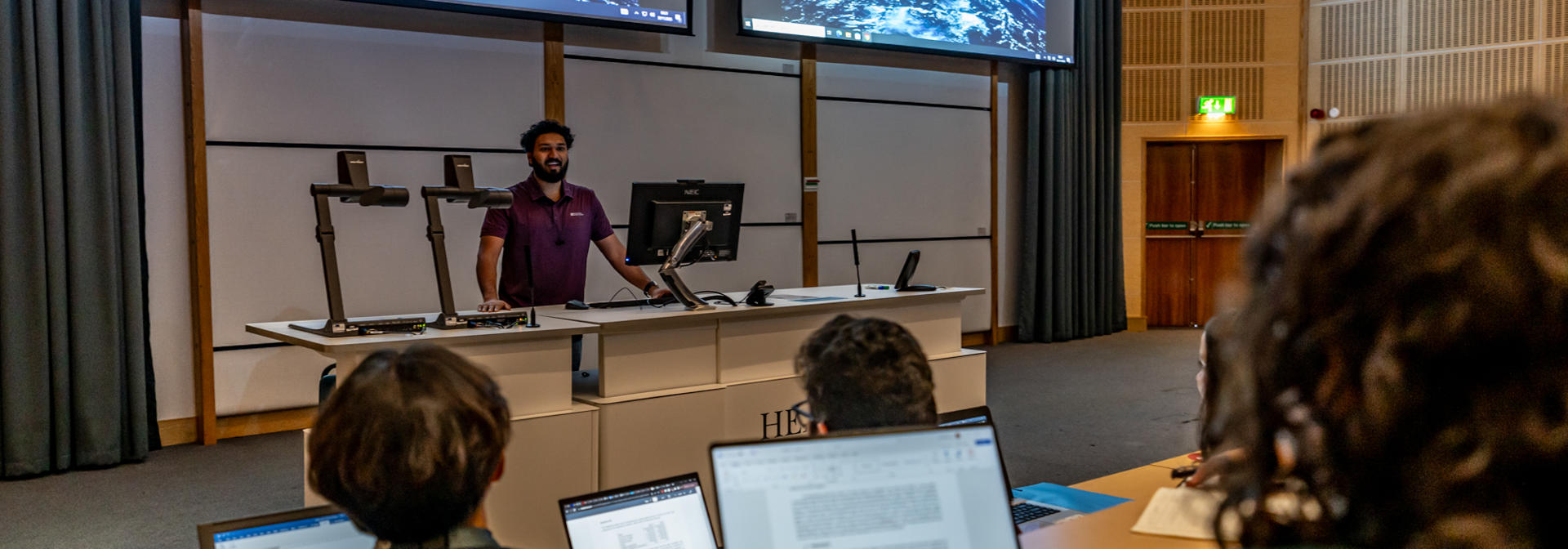 A lecture with students and their laptops