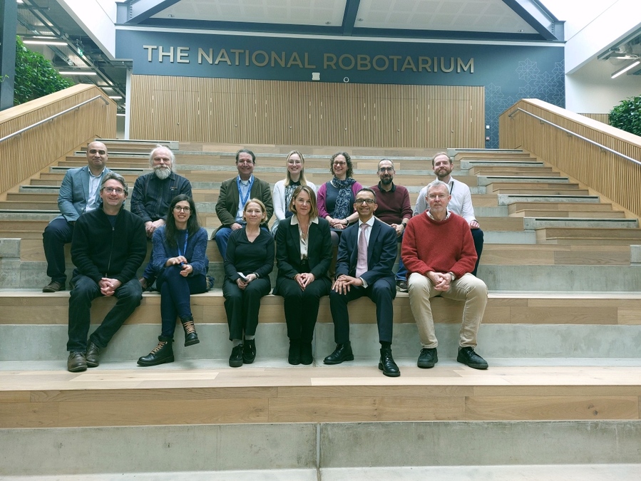 NHS Chief Exec Caroline Lamb with researchers at the National Robotarium