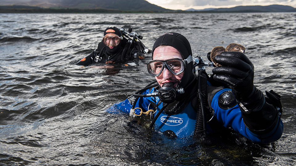 Deep sea divers in Orkney