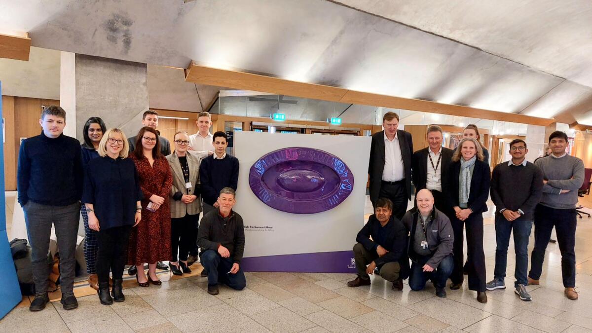 Members of the National Robotarium team at Scottish Parliament