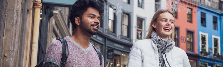 Two Heriot-Watt students walking down Victoria Street in Edinburgh