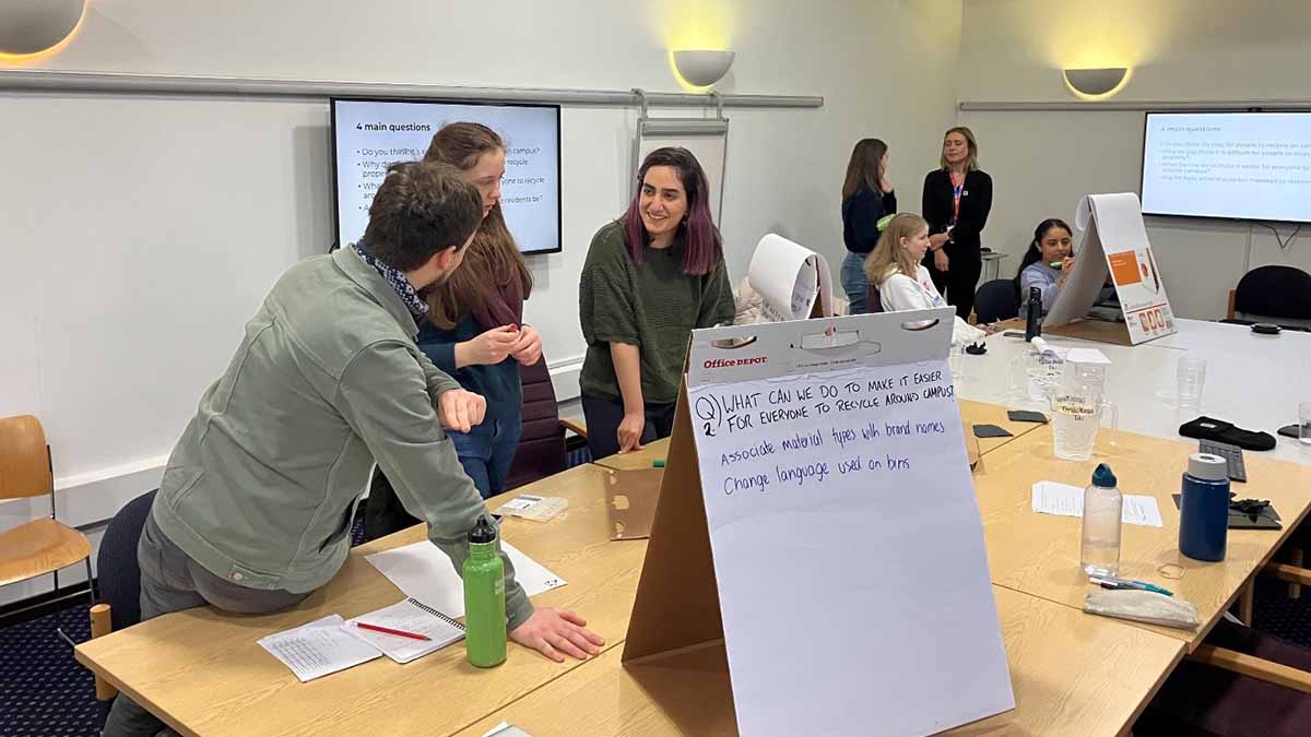 Staff record responses on flipcharts