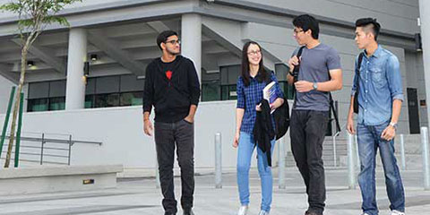 Student walking at Malaysia Campus