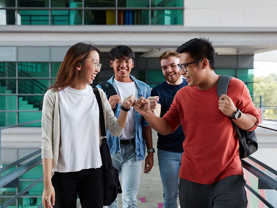 A group of Go Global students outside the Malaysia Campus building