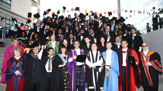 group shot of undergraduate's at the first graduation ceremony