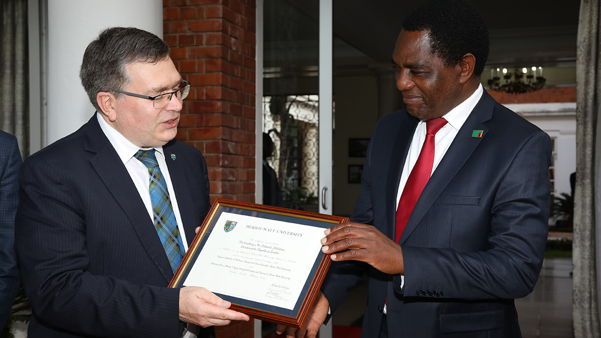 Professor Richard Williams with Zambian President Hakainde Hichilema