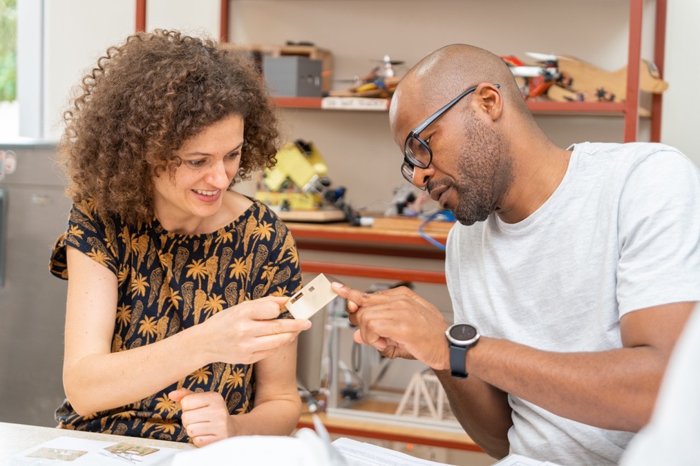 Two scientists collaborating on prototype manufacture