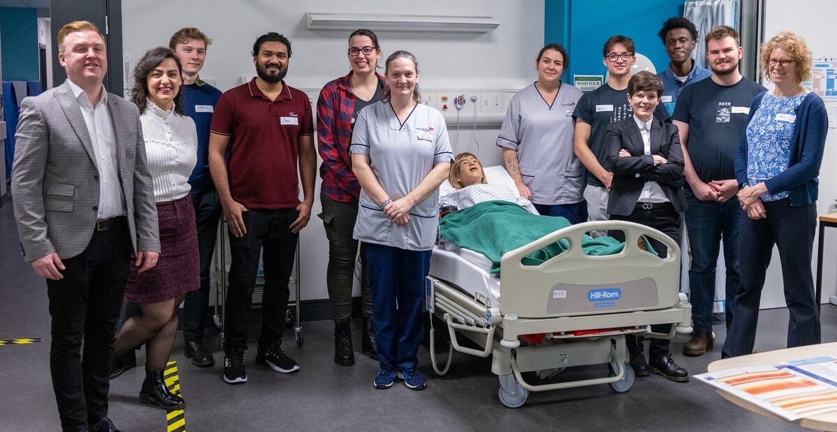 Students and academics in hospital room