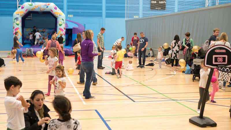 Family group activities in sports hall