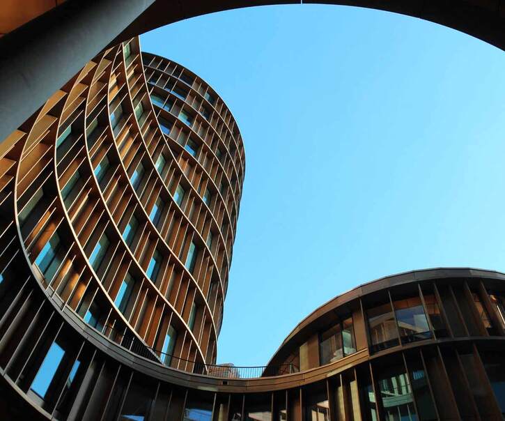 low angle shot of a curved building