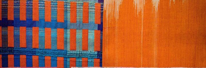 orange and blue grid textile