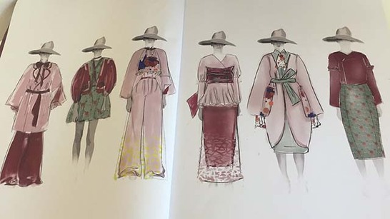 Ladies fashion design drawings on paper