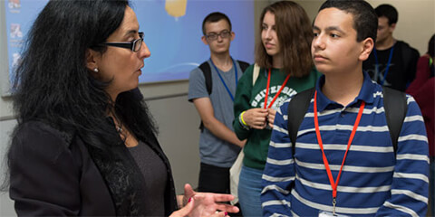 Mercedes Maroto-Valer talking to student
