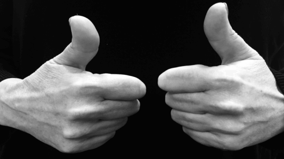 Hands with thumbs up