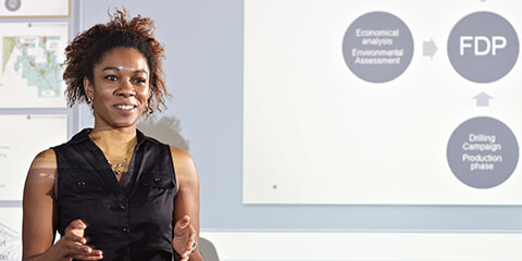 Image of female giving presentation